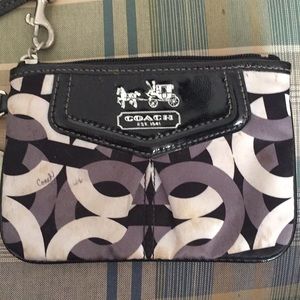 Black and white Coach wristlet